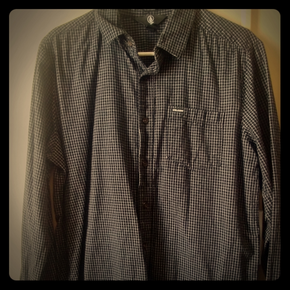 Volcom long sleeved black plaid button down shirt